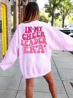 In My Cheerleader Era Sweatshirt, Cheer Hoodie, Cheer Era Shirt, Shirt for Cheer Camp, Cheerleader Gifts, Cheer Competition Gift - Etsy Cute Cheer Stuff, Team Spirit Long Sleeve Sweater With Letter Print, Long Sleeve Team Spirit Cheerleading Sweatshirt, School Spirit Long Sleeve Sweatshirt With Graphic Print, Pre-shrunk Long Sleeve Cheerleading Sweatshirt, School Spirit Graphic Print Long Sleeve Sweatshirt, Pre-shrunk Long Sleeve Sweatshirt For Cheerleading, Cotton Graphic Print Sweatshirt For Cheerleading, Pink Long Sleeve Tops For Cheerleading