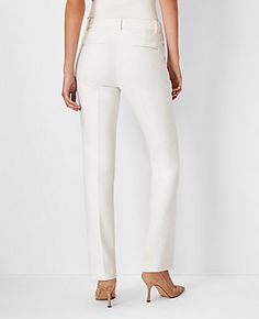 Elevate your wardrobe with the timeless elegance of Ann Taylor's Mid Rise Sophia Straight Pant in Winter White. These pants redefine sophistication with their straight-leg design that skims the legs for a tailored and structured silhouette, perfect for both office and evening wear.

- Size: 12 Regular
- Color: Winter White
- Material: 65% Polyester, 32% Rayon, 3% Spandex
- Fit: Tailored and fitted
- Rise: Mid-rise, sits 2 1/4" below natural waist
- Length: Full length with a 31" inseam and 15 3/ Knitted Suit, Tall Pants, Gender Female, Straight Pants, Winter White, Ann Taylor, Straight Leg Pants, Evening Wear, Effortless Style