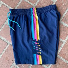 Nike Swim Shorts With Liner Navy Sporty Bottoms For Spring, Sporty Navy Bottoms For Spring, Nike Blue Shorts For Summer, Blue Nike Bottoms With Pockets, Casual Royal Blue Bottoms For Spring, Nike Blue Bottoms With Elastic Waistband, Nike Casual Blue Bottoms, Nike Navy Shorts For Summer, Nike Blue Bottoms For Summer