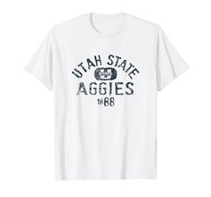 PRICES MAY VARY. Officially Licensed Utah State University apparel. Show your support for the Aggies with this Utah State logo apparel! The soft material and digitally printed logo make this a great addition to any Utah State Aggies apparel collection! Go Aggies! Wear this fan favorite Utah State Aggies apparel to the big game or just hanging out or around the house. The unique vintage logo will let everyone know your affiliation with USU! Lightweight, Classic fit, Double-needle sleeve and botto University Apparel, Utah State University, Utah State, Clothing Logo, Big Game, Vintage Logo, Logo T Shirt, State University, Vintage Tshirts