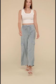 Washed Linen Elastic Drawstring Waist Cargo Pants Spring Straight Leg Cargo Pants With Drawstring, Summer Full Length Cargo Pants With Elastic Waistband, Utility Cargo Jeans With Elastic Waistband, Casual Cargo Pants With Drawstring And Loose Fit, Summer Cargo Jeans With Elastic Waistband And Relaxed Fit, Utility Wide Leg Cargo Jeans With Drawstring, Utility Bottoms With Drawstring And Loose Fit, Utility Bottoms With Drawstring And Loosely Fitted Hips, Casual Wide Leg Cargo Jeans With Elastic Waistband