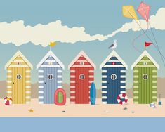 a group of beach huts sitting on top of a sandy beach