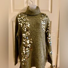 Gorgeous Dark Olive Green Sweater With Multi Silver Embellishment On Front And Sleevem Sizenew With Tagnever Worn Embellished Sweater For Spring Party, Spring Party Embellished Sweater, Dark Green Floral Sweater, Winter Green Floral Print Sweater, Chunky Olive Green Sweater, Green Long Sleeve Fair Isle Sweater, Green Sewuin Sweater, Olive Green Sweater, Dark Olive Green