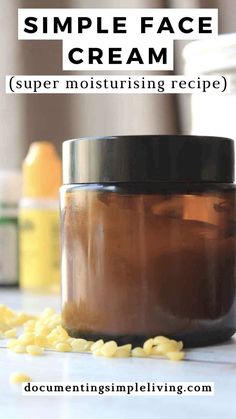 An amber glass jar with homemade nourishing anti-wrinkle face cream inside. There are essential oils and a glass jar in the background. Anti Aging Face Cream Diy, Simple Face