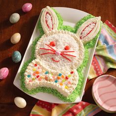 an easter bunny cake on a white plate