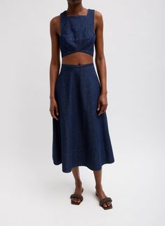 The Summer Denim Square Neck Cropped Top, elevates your perception of crop tops. Crafted from 100% light weight denim from Japan with snaps along one of the sides for closure, making it the perfect crop to add into your rotation this season. With endless styling permutations, don’t shy away, this top can pair back to the matching Summer Denim Circle Skirt, a jean and beyond, dealers’ choice. 100% Cotton Style Number: U124SM7841 Available in: Indigo Spring Denim Bottoms With Cropped Hem, Spring Cropped Hem Denim Bottoms, Spring Cropped Denim Top With Pockets, Spring Cropped Denim Top, Fitted Spring Bottoms With Cropped Hem, Fitted Denim Top With Pockets For Summer, Fitted Cropped Bottoms For Spring, Cropped Crop Top With Pockets For Spring, High Waist Denim Blue Cotton Crop Top