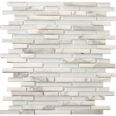 white marble mosaic tile backsplashes