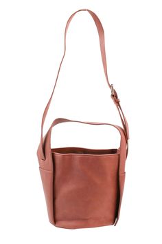 New Design! What a fun bucket bag! It has a round bottom, offering more capacity. Grab and go with the hobo strap or use the adjustable crossbody for handsfree shopping. 7.5x8.5x4 Adjustable Crossbody Strap Outside Pockets Round Bottom Vegan Leather Brown Bucket Bag For On-the-go, Versatile Crossbody Bucket Bag For On-the-go, Versatile Brown Bucket Bag For On-the-go, Everyday Bucket Hobo Bag With Detachable Strap, Brown Bucket Hobo Bag For Daily Use, Versatile Bucket Bag With Adjustable Strap For On-the-go, Everyday Use Hobo Bag With Detachable Strap, Brown Bucket Bag For Everyday Use, Brown Double Handle Bucket Bag For On-the-go