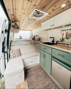 the interior of an rv is clean and ready to be used as a camper