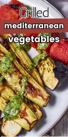 grilled mediterranean vegetables on a plate with text overlay that reads grilled mediterranean vegetables