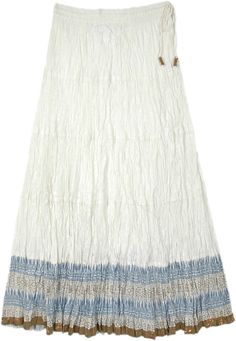 A beautiful multi-panel long skirt with white body in a slightly flouncy and light fabric. The skirt has an elastic waist with a tassel drawstring. #tlb #MaxiSkirt #Printed #WhiteSkirt #FairyCoreSkirt Long Beach Skirt With Tassels, Beach Long Skirt With Tassels, Spring White Skirt With Tassels, White Tassel Skirt For Spring, Bohemian White Maxi Skirt With Gathered Detail, Bohemian White Gathered Maxi Skirt, White Bottoms With Tassels For Spring, White Pleated Maxi Skirt For Beach, White Skirts Long