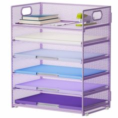 the purple shelf is holding many files and folders