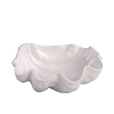 a white bowl sitting on top of a table