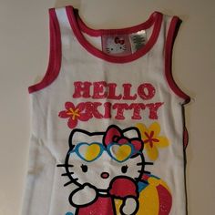 Hello Kitty Toddler Girls T-Shirts Tank Top 2t Or 4t Nwt Hello Kitty T-shirts & Tank Tops, Cute Sleeveless T-shirt For Playwear, Cute White Sleeveless T-shirt, Cute Hello Kitty Tops For Summer, Kawaii Cotton Tops For Playtime, Cotton Kawaii Tops For Playtime, Playful Hello Kitty Summer Tops, Summer Hello Kitty Fun Tops, Hello Kitty Summer Tops