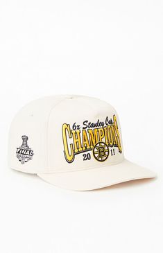 a white hat with the word champion printed on it