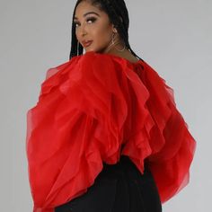 Make A Statement With This Eye-Catching Ruffle Tulle Blouse. Expertly Designed With Plus Sizes In Mind, This Crop Top Features Layers Of Luxurious Tulle Fabric Gathered Together To Create Beautiful Ruffles. The Airy Fabric Is A Perfect Addition To Dressy And Casual Looks Alike, While The Timeless Color Makes It Easy To Incorporate Into Any Wardrobe. Take Your Ensemble To The Next Level With This Fashionable Plus Size Blouse. -Plus Size Ruffle Tulle Crop Top Blouse Red -Ruffled Tulle -Cropped Top Chic Red Blouse For Evening, Chic Red Party Blouse, Elegant Red Ruffled Blouse, Evening V-neck Blouse With Ruffles, Red Evening Blouse For Spring, Red Ruffled Tops For Evening, Chic Red Blouse With Ruffles, Chic Red Blouse For Night Out, Fall Party Tops With Ruffles