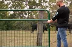 Our 2" x 4" wire-filled gate keeps horses and small animals safely contained with no dangerous catch points. Our 2" x 4" wire-filled gate is constructed with 1-3/4" round steel tubing and our corrosion-resistant powder coat finish and arrives complete and ready to hang with hinge pins and snap chain. Notes: all 1-3/4" gates are 3" shorter than listed length to allow for gate hardware and proper clearance. Recommended for light confinement only. Tarter 4-ft H x 12-ft W Green Powder Over E-coat Steel Corral Flat-top Farm Fence Gate | WFGG12 Farm Fence Gate, Metal Fence Gates, Diy Dog Fence, Metal Fencing, Top Farm, Driveway Entrance, Farm Gate, Farm Fence, Gate Hardware