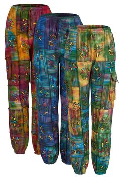 Long hippie patchwork trousers with cargo pockets Lightweight non stretchy cotton, two hip pockets and two cargo pockets, elasticated cuff, long length  S/M size - waist 28 - 36 inches, hips up to 40 inches, length 40 inches (approx fit UK 8 - 12) L/XL size - waist 32 - 40 inches, hips up to 48 inches, length 41 inches (approx fit UK 14 - 16) XXL size - waist 34 - 42 inches, hips up to 50 inches, length 41 inches (approx fit UK 18 - 20) US Size conversion: Minus 2 sizes to get your US size (for Bohemian Cargo Pants With Pockets For Festival, Bohemian Cargo Pants For Festivals, Multicolor Harem Pants With Pockets, Multicolor Harem Pants With Pockets For Festival, Hippie Multicolor Harem Pants With Pockets, Multicolor Hippie Harem Pants With Pockets, Hippie Multicolor Pants With Pockets, Multicolor Cotton Pants With Patch Pockets, Hippie Harem Pants With Pockets