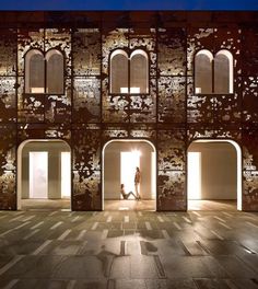 three different views of an old building with windows