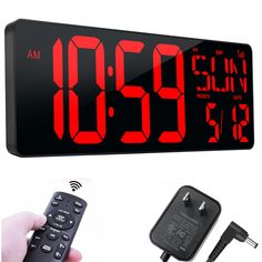 an alarm clock with the time displayed on it's display and other items to be used