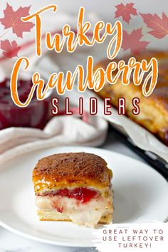 a piece of turkey cranberry sliders on a white plate with the title overlay