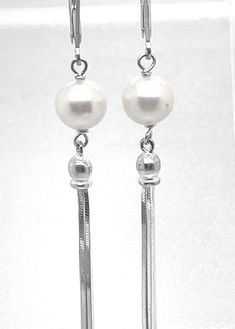 "Sterling Silver Tassel and 7mm Freshwater Pearl Earrings on Sterling Silver Leverbacks  Long Evening Silver Tassel and Pearl Earrings 1  1/2\" Long  Bridal Earrings  Petite, yet long earrings. Elegant and classic!" Cheap White Tassel Earrings With Dangling Beads, Long Drop Sterling Silver Pearl Earrings For Gift, Luxury Sterling Silver Earrings With Pearl Chain, Luxury Long Drop Sterling Silver Pearl Earrings, Formal Sterling Silver Pearl Earrings, Fine Jewelry, Silver Nickel-free Drop Tassel Earrings, Elegant Silver Nickel-free Tassel Earrings, Tahitian Pearl Pendant, Long Bridal Earrings