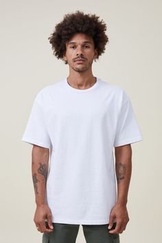 HEAVY WEIGHT T-SHIRT Boxy Fit Crew Neck T-shirt For Streetwear, Basic Crew Neck Muscle Tee For Streetwear, White Short Sleeve Sporty Muscle Tee, White Relaxed Fit Crew Neck Muscle Tee, White Sporty Short Sleeve Muscle Tee, White Crew Neck Muscle Tee For Streetwear, White Graphic Print Muscle Tee, Streetwear Muscle Tee With Relaxed Fit And Short Sleeves, Relaxed Fit Short Sleeve Muscle Tee For Streetwear