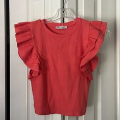 Zara Top Coral Size Medium Never Worn Before Solid Color T-shirt With Ruffle Sleeves For Spring, Summer Ruffle T-shirt With Flutter Sleeves, Summer Ruffle Flutter Sleeve T-shirt, Summer Flutter Sleeve Ruffled T-shirt, Solid Color Crew Neck Top With Ruffles, Spring Crew Neck Tops With Ruffles, Trendy Ruffled T-shirt For Spring, Spring Ruffled Crew Neck Tops, Pink Ruffle Sleeve T-shirt With Ruffles