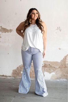 Denim stripe high waisted Lace Up Flare Jeans. Can be paired with your favorite tops! This non stretchable denim can be a perfect wear for all occasions. Fits True to size Trendy High-waisted Bottoms With Vertical Stripes, Trendy Striped Long Pants, Trendy Vertical Stripes Pants For Spring, Trendy Pants With Vertical Stripes For Spring, Trendy High Waist Striped Pants, Casual High Waist Vertical Stripes Pants, Trendy High-waist Striped Pants, Stretch Striped Cotton Pants, Summer Wide Leg Bottoms With Striped Hem