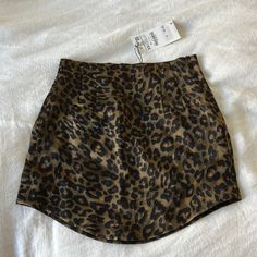 Zara Mini Skirt Nwt Size: Xs Satin Material; Dark Green Animal Print Concealed Zip On Side Trendy Fitted Zara Skirt, Trendy Fitted Zara Mini Skirt, Zara Trendy Fitted Mini Skirt, Fitted Leopard Print Skirt, Zara Fitted Mini Bottoms, Zara Fitted Mini Skirt, Trendy Fitted Leopard Print Skirt, Casual Fitted Leopard Print Mini Skirt, Fitted Leopard Print Mini Bottoms