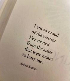 an open book with the words i am so proud of the warrior i've created from the ashes that were meant to buy me