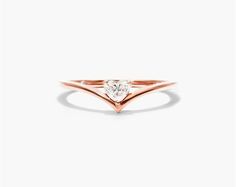 14K Rose Gold Heart Shape Diamond Pinnacle Ring. The twinkle of the diamond complements the effortless style of the band. Wear this ring to shine like a star in the sky. Promise Heart Ring In Rose Gold With Brilliant Cut, Rose Gold Heart Ring With Brilliant Cut For Promise, Rose Gold Solitaire Heart Ring For Promise, Rose Gold Brilliant Cut Heart Promise Ring, Rose Gold Heart Ring, Round Cut, Fine Jewelry, Rose Gold Heart Cut Stackable Rings For Promise, Classic Heart Diamond Ring In Rose Gold, Rose Gold Round Cut Heart Ring In Fine Jewelry, Rose Gold Diamond Heart Ring With Round Cut