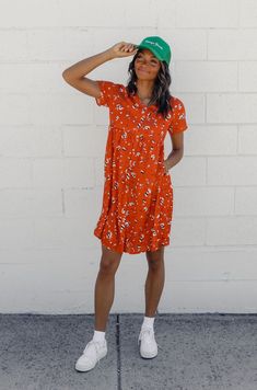 Get ready to meet your new favorite dress! This floral beauty has a lovely v-neckline and shimmery mother-of-pearl buttons. Perfect for any occasion, it can go from casual to formal in a snap! fully lined pockets // paired with the vintage goods foam trucker hat *FINAL SALE* Athleisure Mom, Clogs Heels, Invert Colors, Mom Accessories, Nursing Friendly, Baby Milk, Skirt Jumpsuit, Capri Blue, Button Down Dress