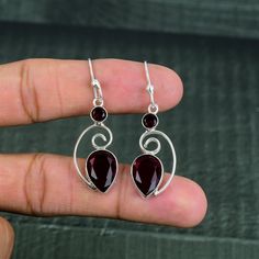 Flat 75% off when you will add 3 or more items in your cart of our store. Red Garnet Earring Handmade Boho Jewelry 925 Sterling Silver Earrings Gemstone Elegant Earring Amazing Jewelry Gift For Love, Christmas Gift Main Stone Name: Red Garnet Main Stone Color:  Red Main Stone Creation: Lab Created Metal: 925 Sterling Silver Note: This jewelry is made of Lab Created gemstones, So their can be difference in the gemstone shade & color because the picture is taken in bright lightening conditions And Valentine's Day Sterling Silver Drop Earrings, Garnet Drop Earrings As Gift, Garnet Gemstone Earrings, Garnet Gemstone Earrings As A Gift, Valentine's Day Gemstone Earrings Gift, Gemstone Drop Earrings For Valentine's Day, Garnet Drop Earrings For Gifts, Sterling Silver Gemstone Earrings For Valentine's Day, Garnet Drop Earrings For Anniversary