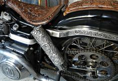 a close up of a motorcycle parked in a garage