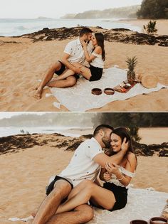 a man and woman sitting on top of a beach next to each other while eating food