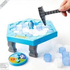 someone is playing with an ice cube game