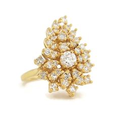 Diamond Cluster Cocktail Statement Ring 14K Yellow Gold .61 CTW, 6.07 Grams This ring is a beautiful and unique ring! Please let us know if you have any questions. Diamonds: .61 ctw; 1 round brilliant cut .23 ct, G, SI1; 38 round single cuts .38 ctw, G, SI2-I1 Metal: 14K yellow gold Weight: 6.07 grams Stamped: NA (x-ray tested) Size: 6.5 (can be sized for a small fee) Width: 22.7 mm top of ring, 1.3 mm bottom of band Condition: small chip on center stone Exquisite Yellow Gold Cluster Diamond Ring, 14k Gold Cluster Diamond Ring With Vvs Clarity, Exquisite Vvs Clarity Cluster Rings, Cluster Diamond Ring, Unique Ring, Diamond Cluster Ring, Diamond Cluster, Statement Ring, Unique Rings