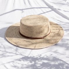 Our classic design in natural palm straw. Handwoven by our artisan partners in Ecuador with a wide-brim and leather strap for days spent under the sun. Mexican Souvenirs, Straw Boater Hat, Cuenca Ecuador, Straw Boater, Wide Brim Straw Hat, Style Bundle, Leather Tie, Boater Hat, Summer Mood