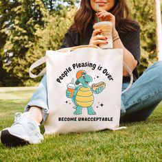 "People Pleasing Turtle, Trendy Tote Bag, Funny Gen Z Tote Bag, Meme Tote Bag, Neurodivergent Gift, ADHD Tote Bag, Mental Health Tote Bag ABOUT THE BAG👝 This 100% cotton bag comes in one size - 15\" x 16\"- perfect for everyday wear. While the canvas material will show off your designs in great colors, it's durable and will last for years. The bag features 20\" handles (made from the same canvas), making it easy to carry even with a week's worth of shopping. .: 100% cotton canvas .: Heavy fabric (12 oz/yd² (406.9 g/m .: Sewn-in label SHIPPING & PRODUCTION INFORMATION -As tote bag is made to order, all orders process and ship out in 5-7 business day  -FREE SHIPPING FOR YOU  🆘RETURN AND REFUND INFORMATION🆘 Due to the customization of our products, we do not accept returns or exchanges. Un People Pleasing, Canvas Making, Trendy Tote Bags, Trendy Tote, Gen Z, Bag Canvas, Divergent, Cotton Bag, Heavy Fabric