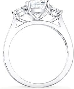 a three stone engagement ring with diamonds on the shoulders