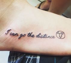 a tattoo saying i can't go the distance on someone's foot,