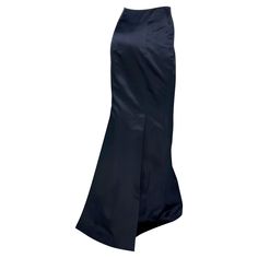 From the 1990s, this Richard Tyler navy blue satin maxi skirt epitomizes classic luxury. Constructed entirely of silk satin, this fabulous floor-length skirt features a flared hem and a small train. Never worn, with the original department store tag still attached! Approximate measurements: Size - 6 Waistband to hem: 45.5" Waist: 26" Hips: 34 - 38" 100% silk Formal Fitted Full Maxi Skirt, Formal Fitted Maxi Length Bottoms, Classic Silk Party Skirt, Formal Fitted Maxi Skirt, Silk Bottoms With Satin Finish For Formal Occasions, Formal Silk Full Skirt Bottoms, Formal Fitted Lined Maxi Skirt, Evening Fitted Full Maxi Skirt, Elegant Fitted Maxi Skirt For Formal Occasions