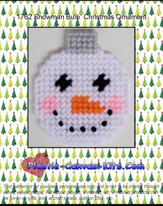 a snowman ornament made out of plastic beads