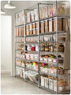 a metal shelving unit filled with lots of food