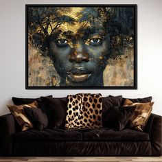 a living room with a couch and painting on the wall above it that has an african woman's face