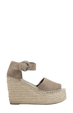 A chunky platform and wedge espadrille sole elevates an open toe sandal that is crafted from a mix of smooth leather and soft suede. 4.33" heel, 2.17" platform Adjustable ankle strap with buckle closure Leather and suede upper/manmade sole Imported Summer Suede Sandals With Woven Sole, Suede Open Toe Wedge Sandals With Woven Sole, Suede Platform Wedge Sandals For Vacation, Suede Open Toe Espadrilles With Cushioned Footbed, Suede Wedge Sandals For Beach, Suede Wedge Sandals For Beach In Summer, Suede Wedge Sandals For Summer Beach, Spring Beach Suede Wedge Sandals, Summer Suede Open Toe Espadrilles