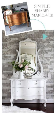 a white dresser sitting next to a mirror on top of a wooden table with flowers