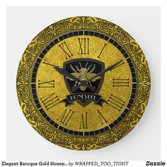 a gold clock with black trim and roman numerals