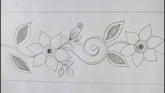 a drawing of flowers and leaves on paper